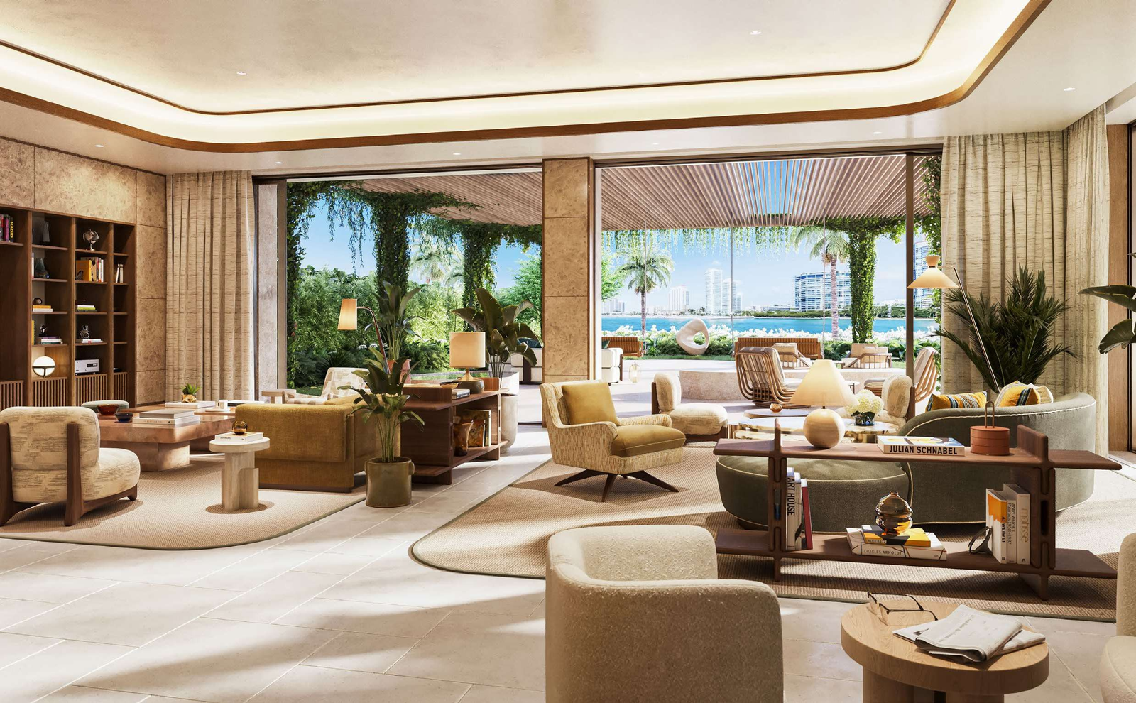 Elegant lounge at 6 Fisher Island Residences with modern furnishings, seamless indoor-outdoor flow, lush greenery, and stunning waterfront views